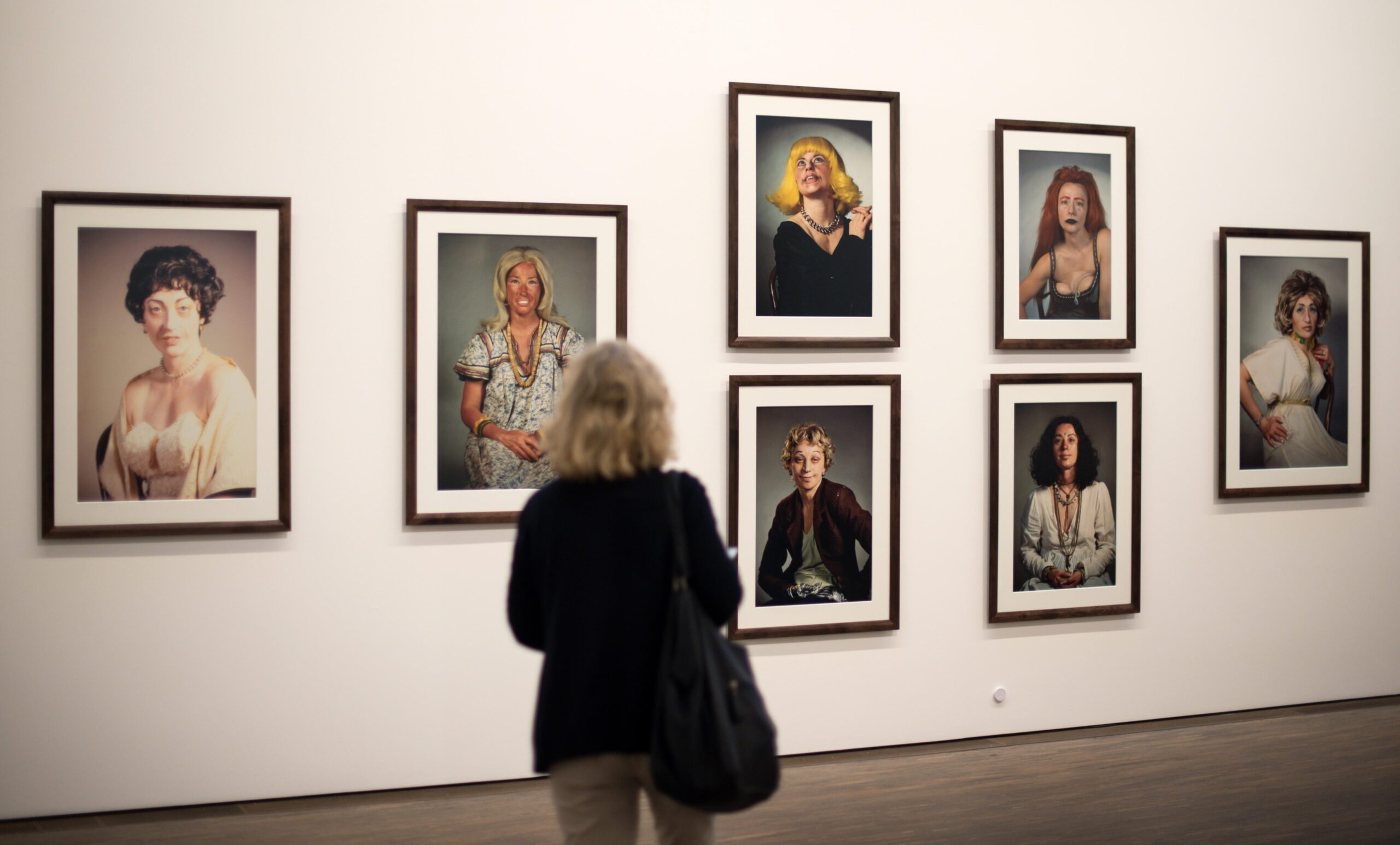 A woman looks at images by photographer Cindy Sherman in a gallery in Berlin, Germany, 14 September 2015. 65 photographs by the artist will be showcased in an exhibition entitled 'Cindy Sherman - Works from the Olbricht Collection' starting on 16 September as part of the Berlin Art Week. Credit: dpa picture alliance/Alamy Live News