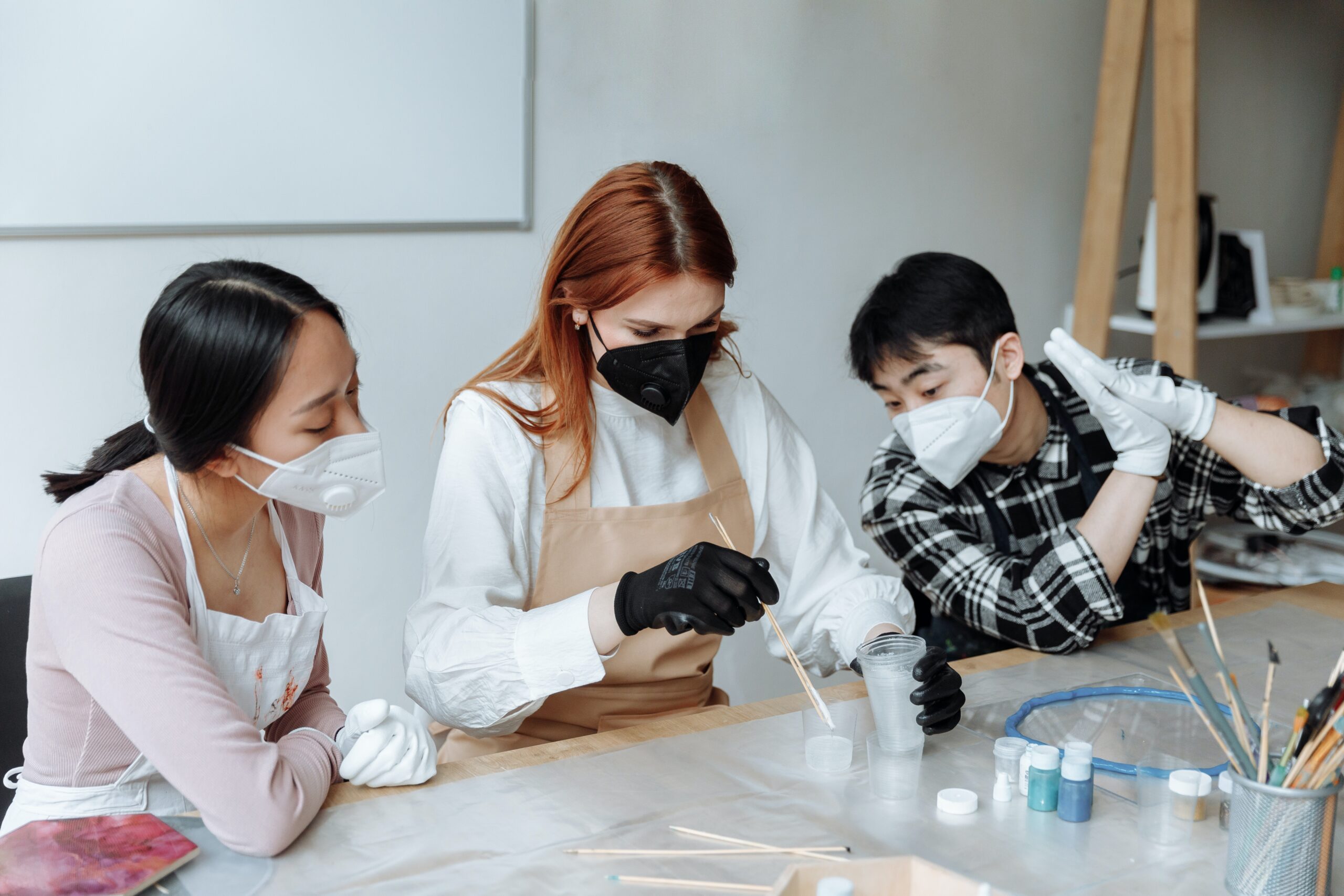 Art students prepare supplies in a Northeast art school. Photo by Thirdman on Pexels
