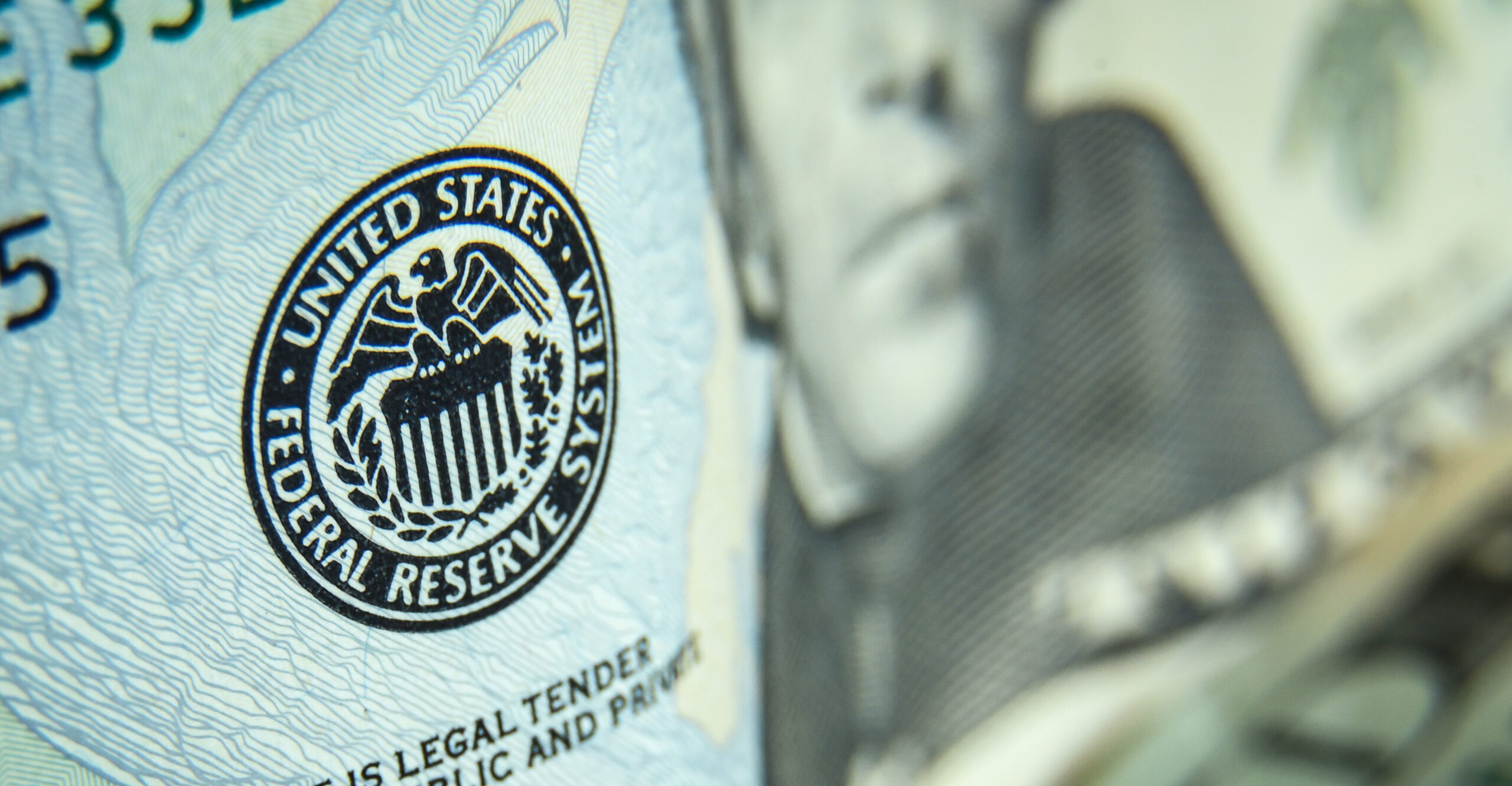 Twenty dollars bills - close up and reflection of US paper money